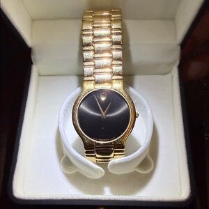 Movado Gold Watch with Black Face
